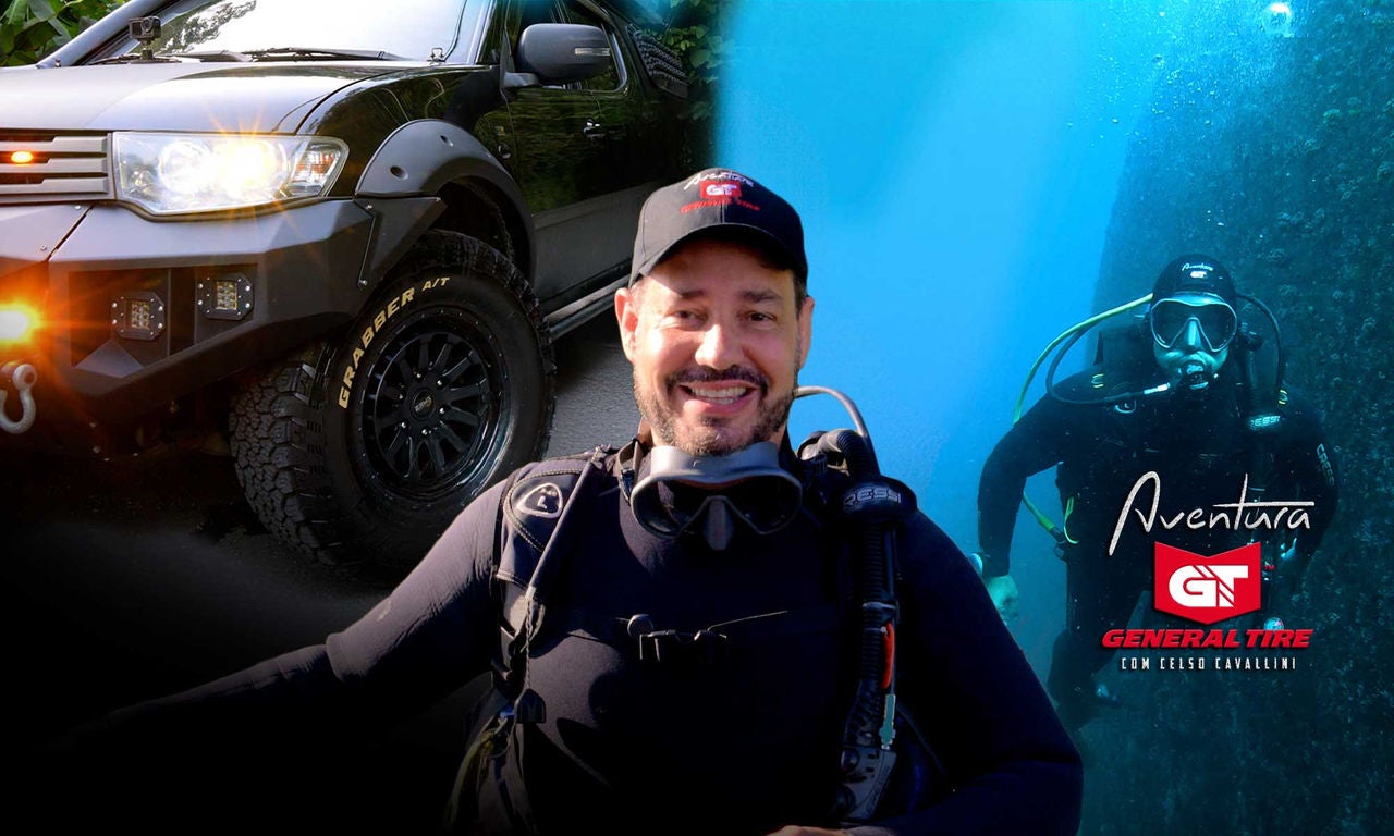 Celso Cavallini sorrindo ao centro, equipado para mergulho, está ao lado de um veículo off-road. Ao fundo, um mergulhador submerso e o logo da General Tire com a palavra "Aventura" são destacados na imagem.